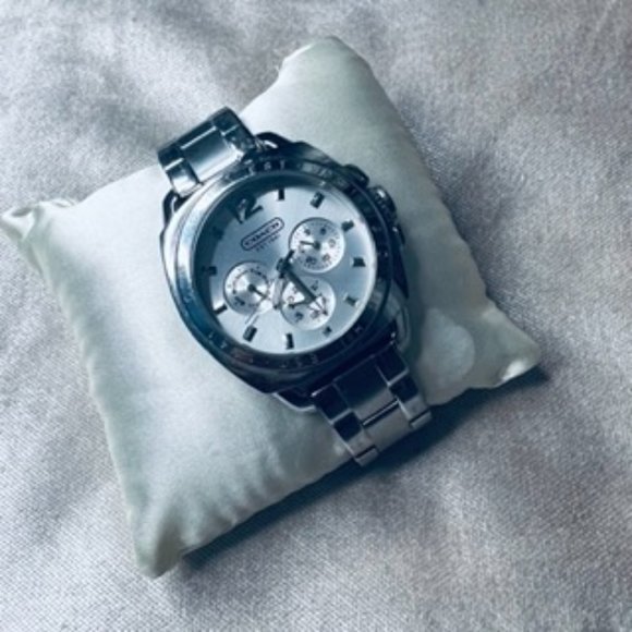 COACH women’s stainless steel women’s watch.